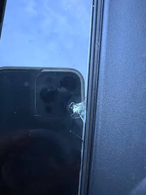 Edge crack on a vehicle windshield requiring replacement